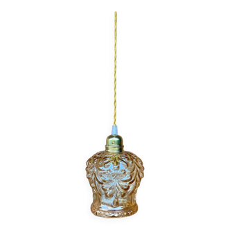 Vintage chiseled amber glass globe pendant light.