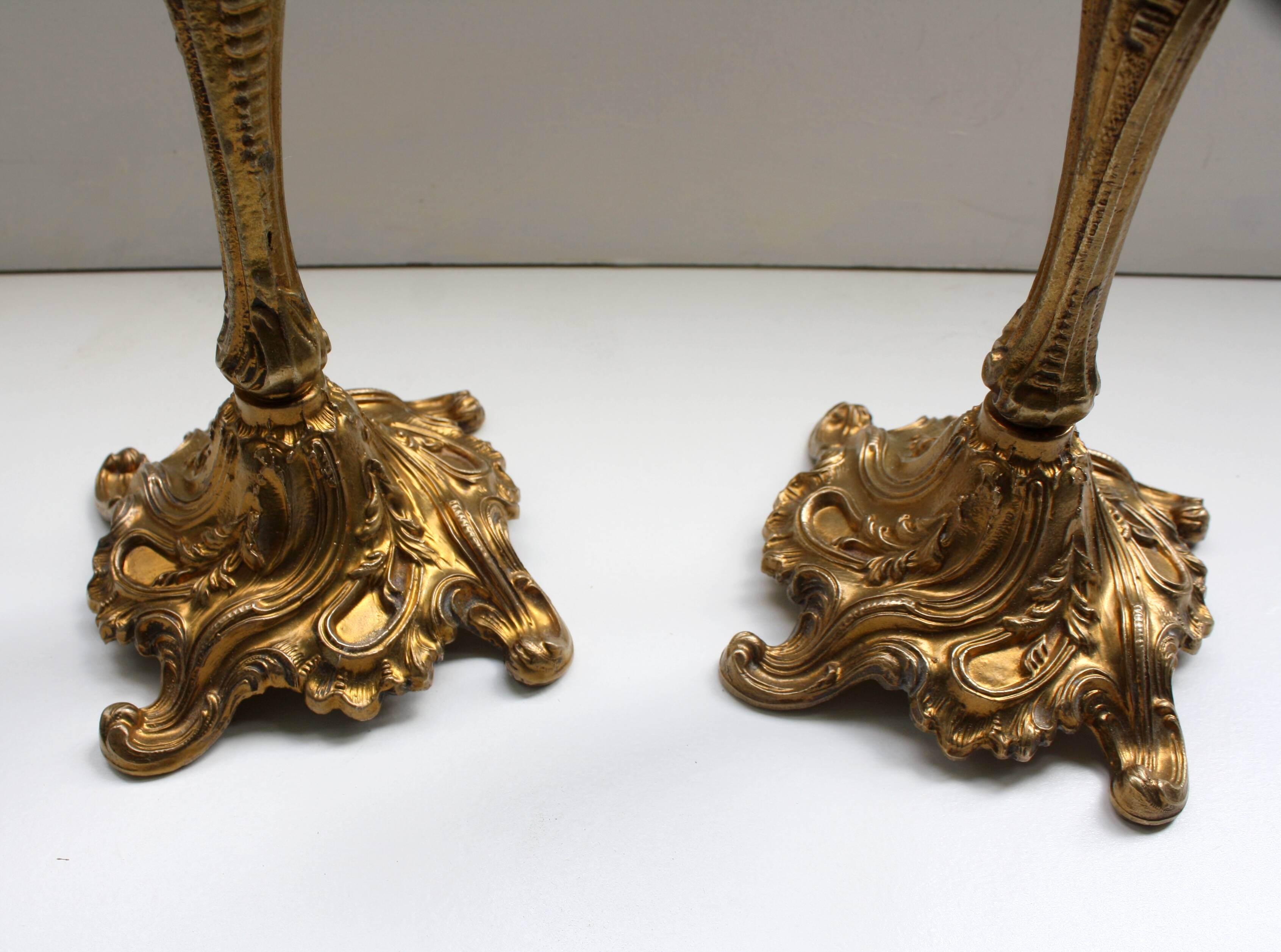 Pairs of Louis XV style gilded bronze candlesticks