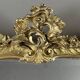 Large gilded wooden mirror in Louis XV style, 19th century.
