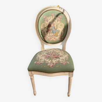 Antique chair in tapestry