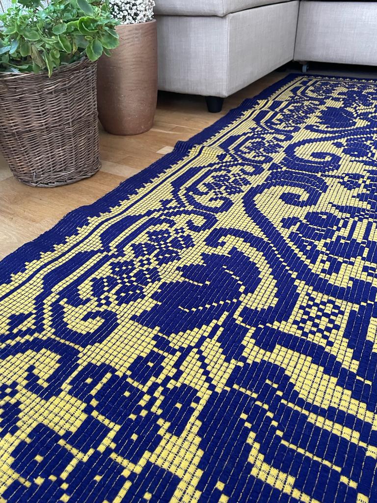 Romanian floral rug handwoven in wool, purple and yellow background
