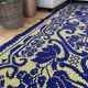 Romanian floral rug handwoven in wool, purple and yellow background