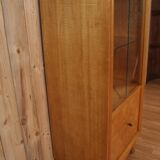 Art deco showcase in waved sycamore