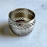 Openwork napkin ring in silver metal