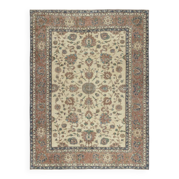 Authentic Vintage Turkish Beige Wool Area Rug with Floral Design. Hand-knotted in Turkey