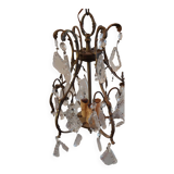 Small bronze "cage" chandelier with three lights decorated with tassels and pendant. Late 19th century