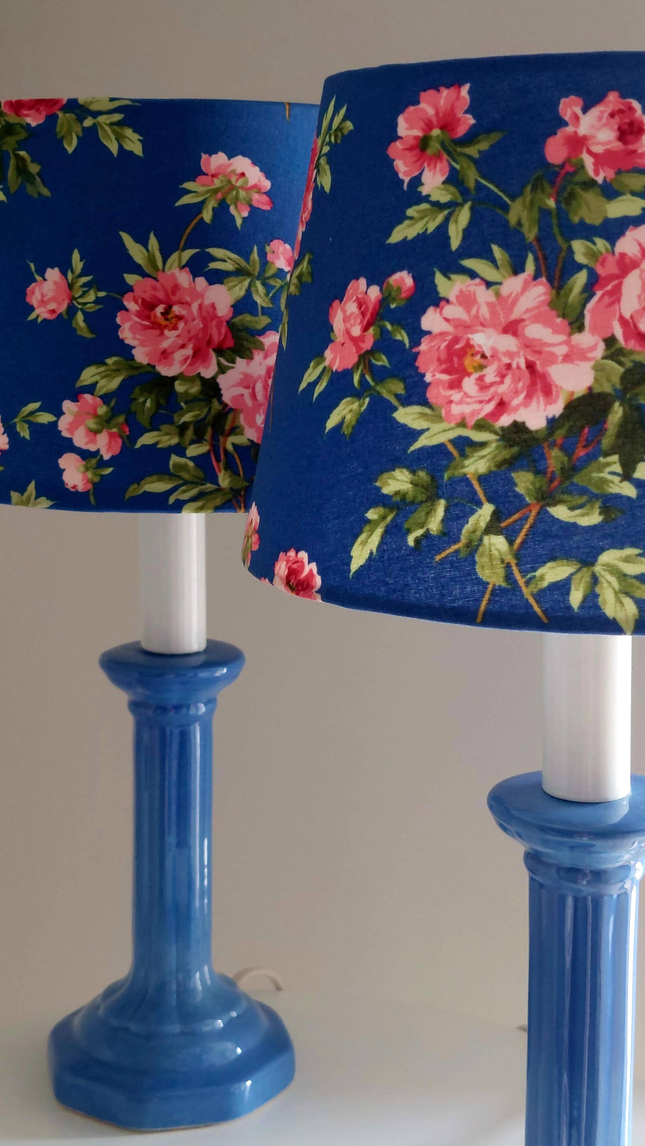 Pair of vintage blue ceramic lamps with Sanderson floral shades.