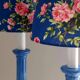 Pair of vintage blue ceramic lamps with Sanderson floral shades.