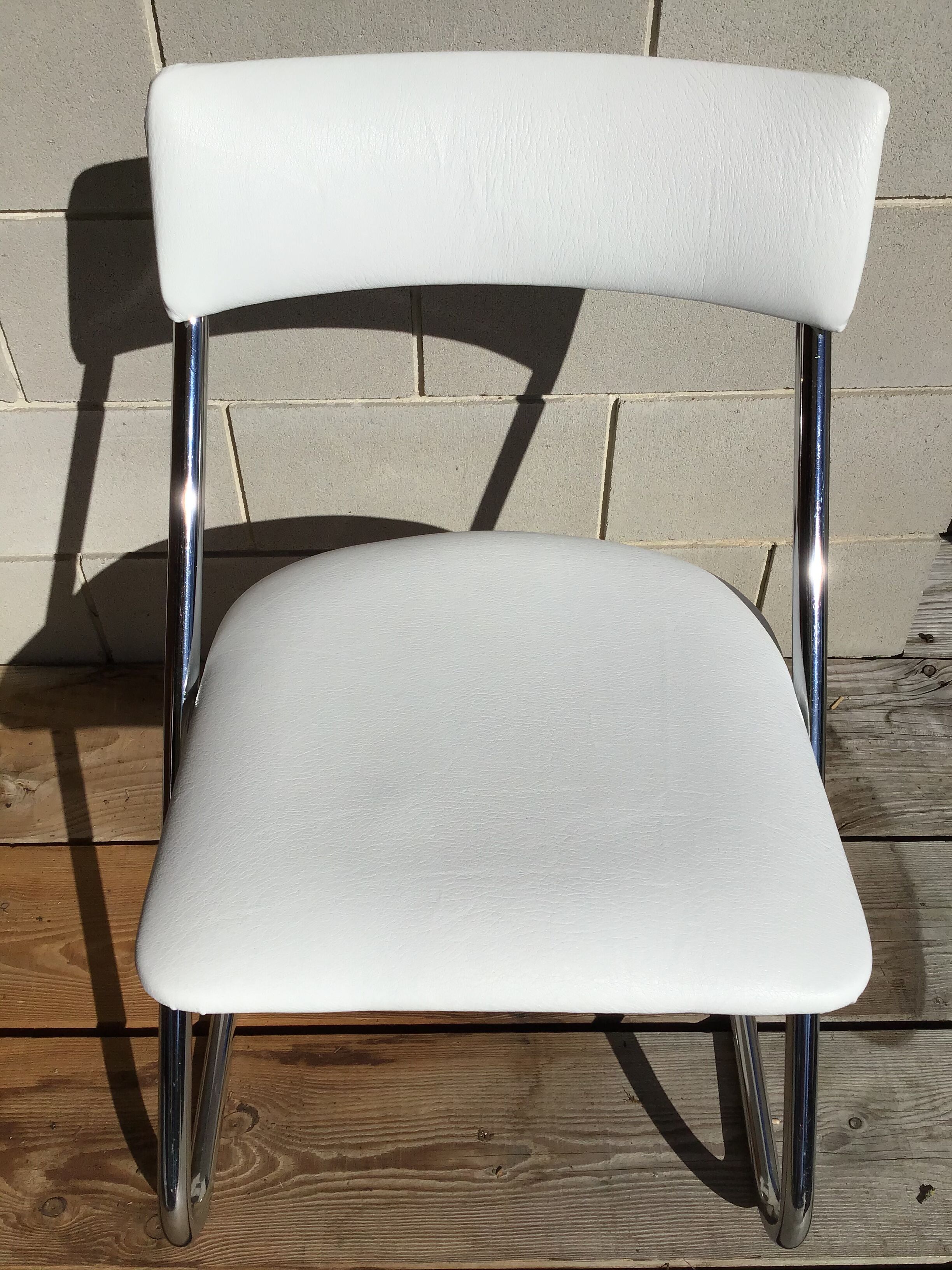 White faux leather sled chair