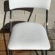 White faux leather sled chair