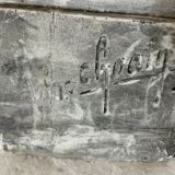 Bust of a young man in plaster signed Gerard Choain XX century