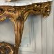 Louis XV style console in carved and gilded wood, circa 1880.