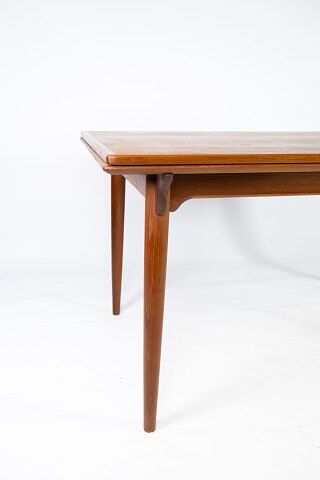 Dining table in teak with extentions of danish design from the 1960s.
