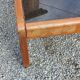 Coffee table from Regain in solid elm with a smoked glass top.