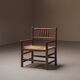 Wicker armchair in solid wood, handcrafted, France, around 1950.