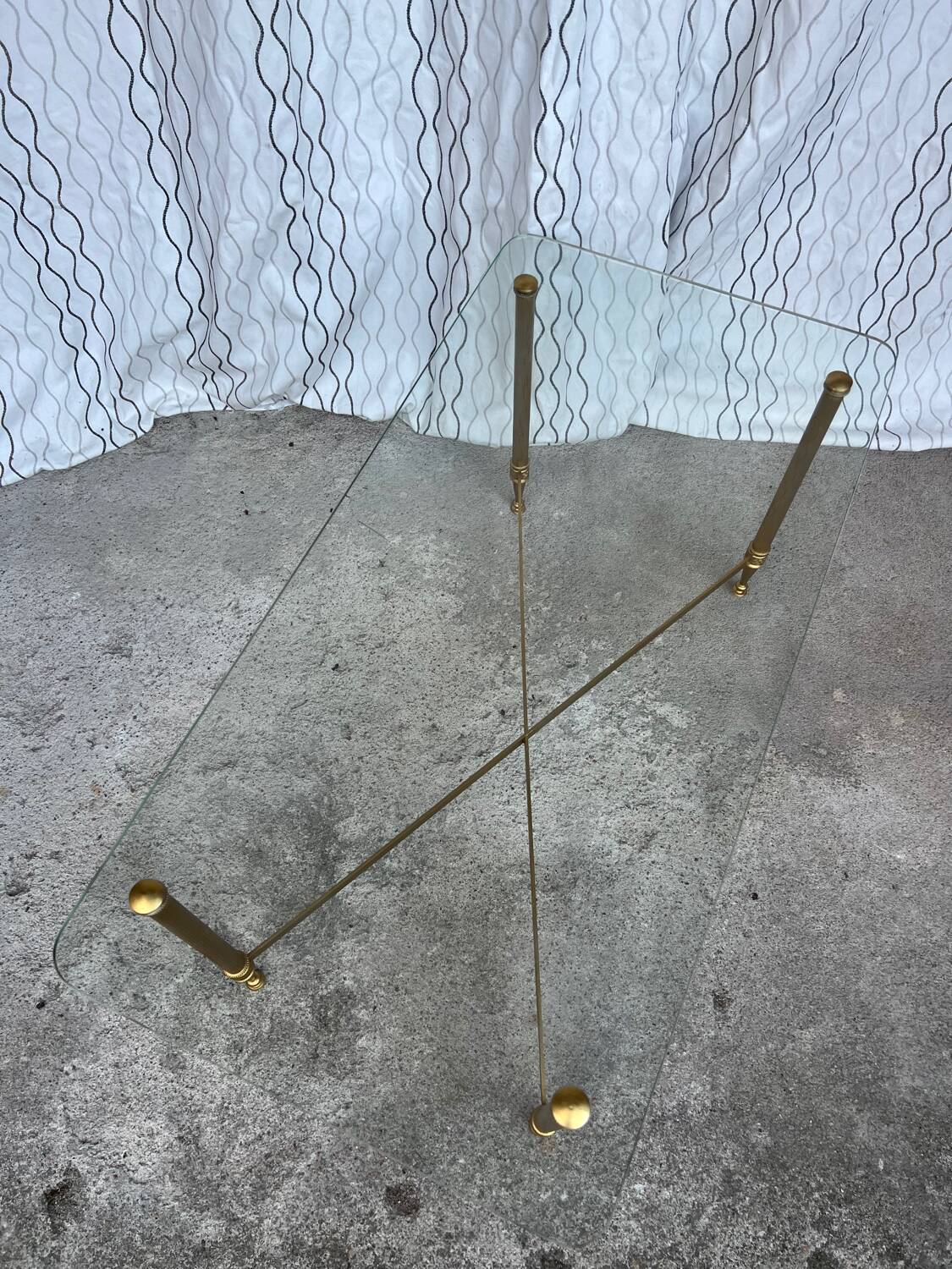 Vintage gold coffee table. Glass top.
