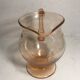 Pink pitcher in bubble glass