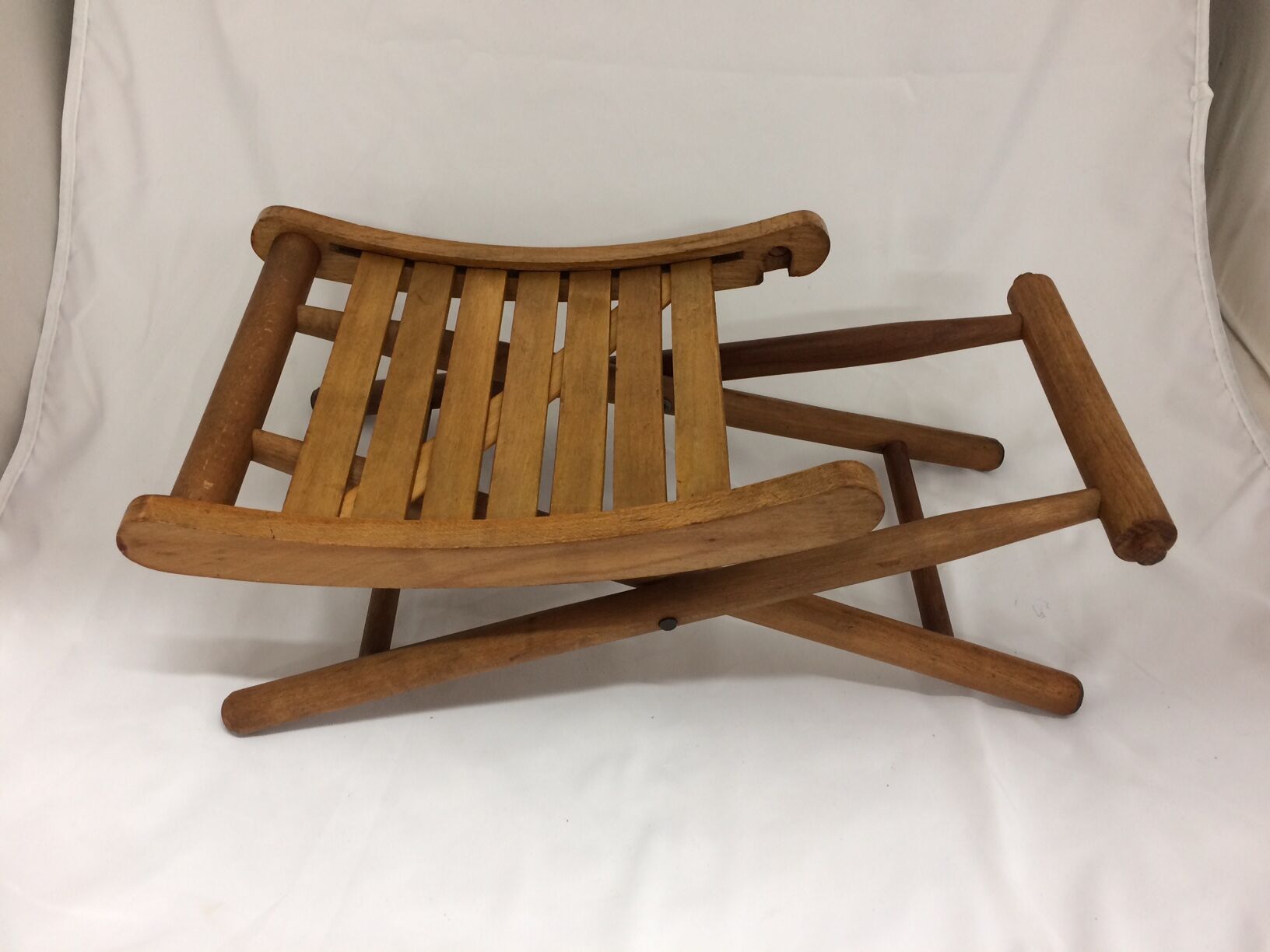 old wooden folding stool