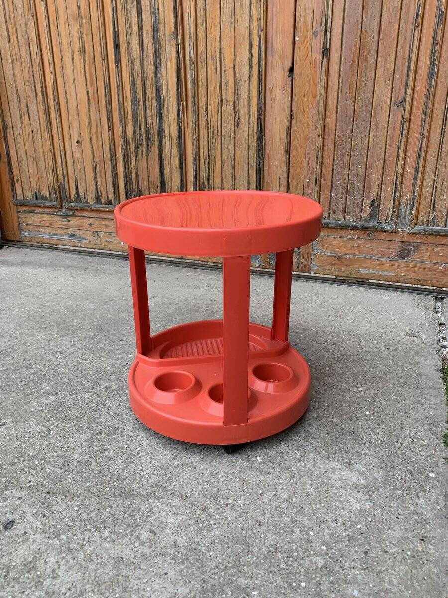 Round red bar cart in injected plastic, Mid-Century Italian style, 1970s.