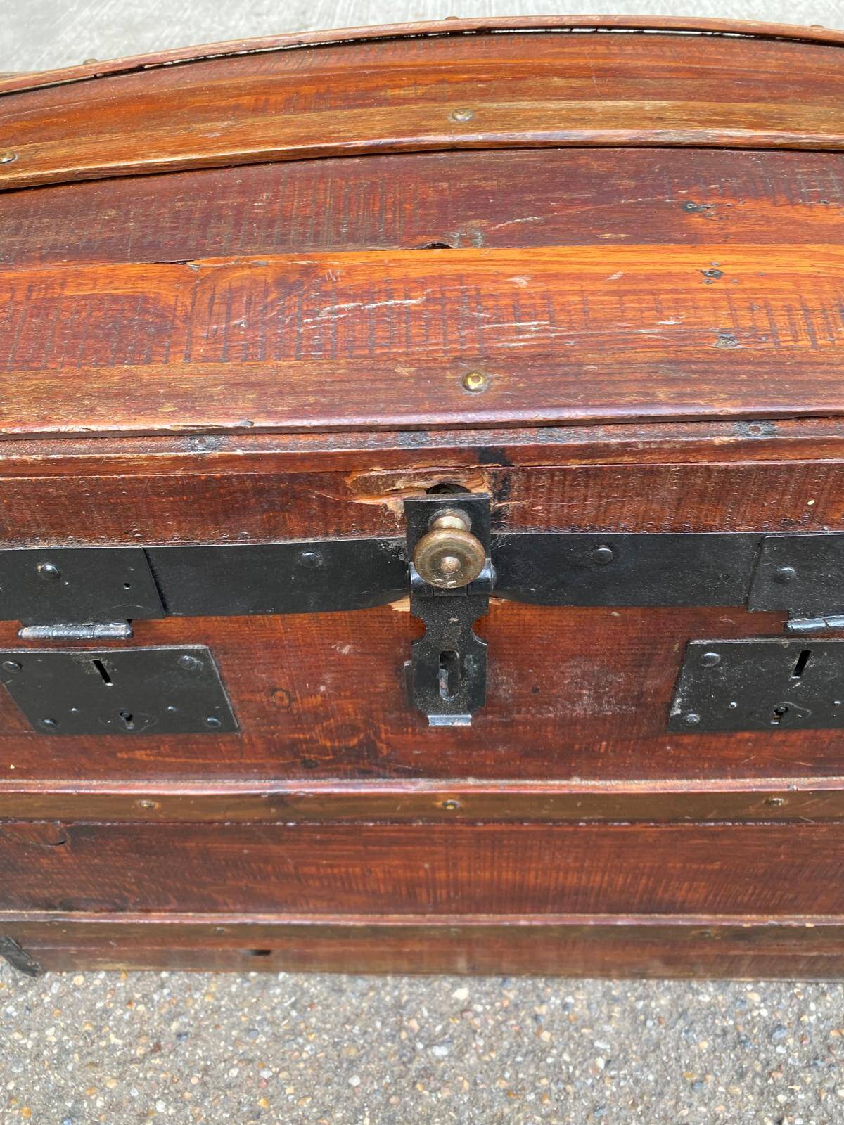 Vintage domed travel trunk from the 19th century.