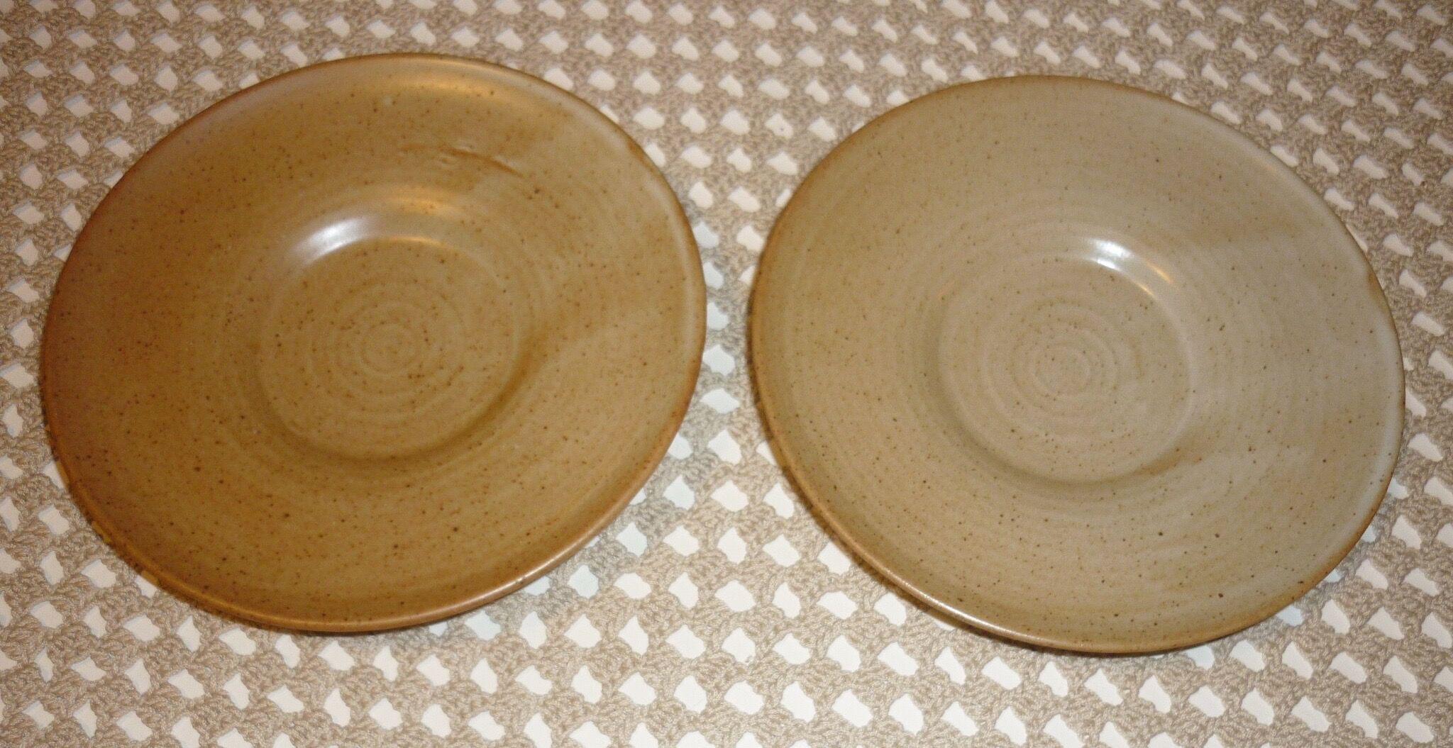 Pair of CNP Village France stoneware saucers