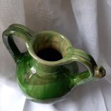 Old glazed terracotta pitcher