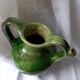 Old glazed terracotta pitcher