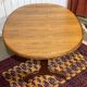 G-Plan oval teak table from the 1970s with a butterfly extension.