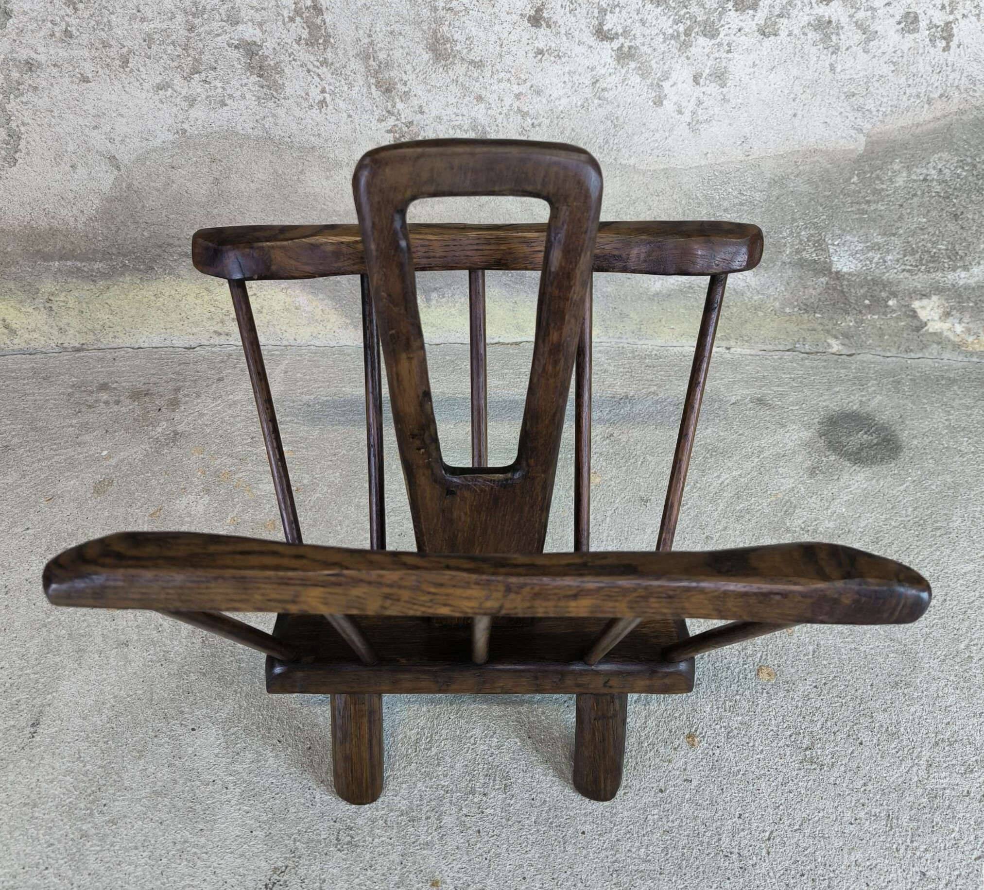 Vintage magazine rack in solid wood.