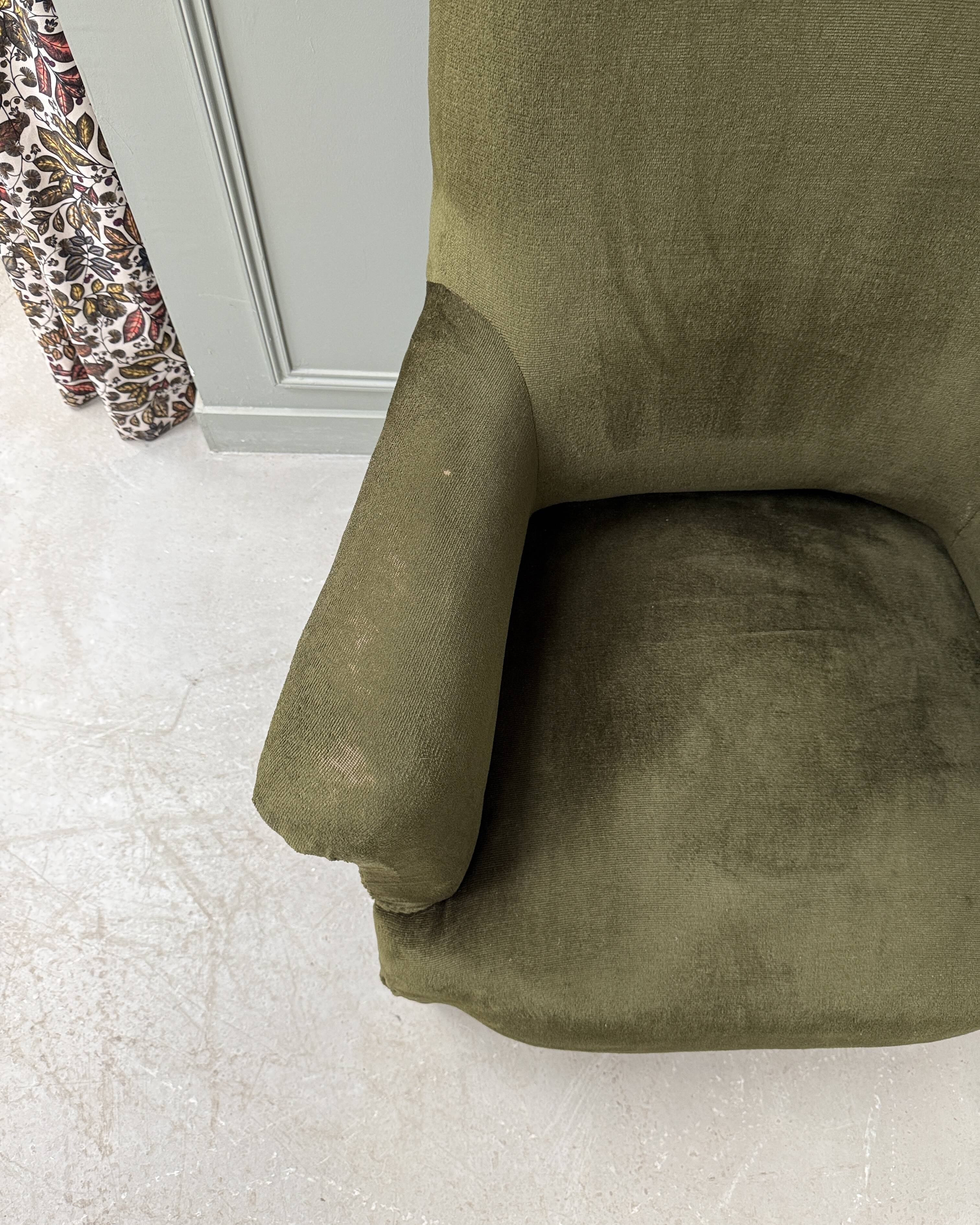 Green velvet tub chair
