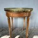 Hot water bottle table with a marble top and a brass gallery.