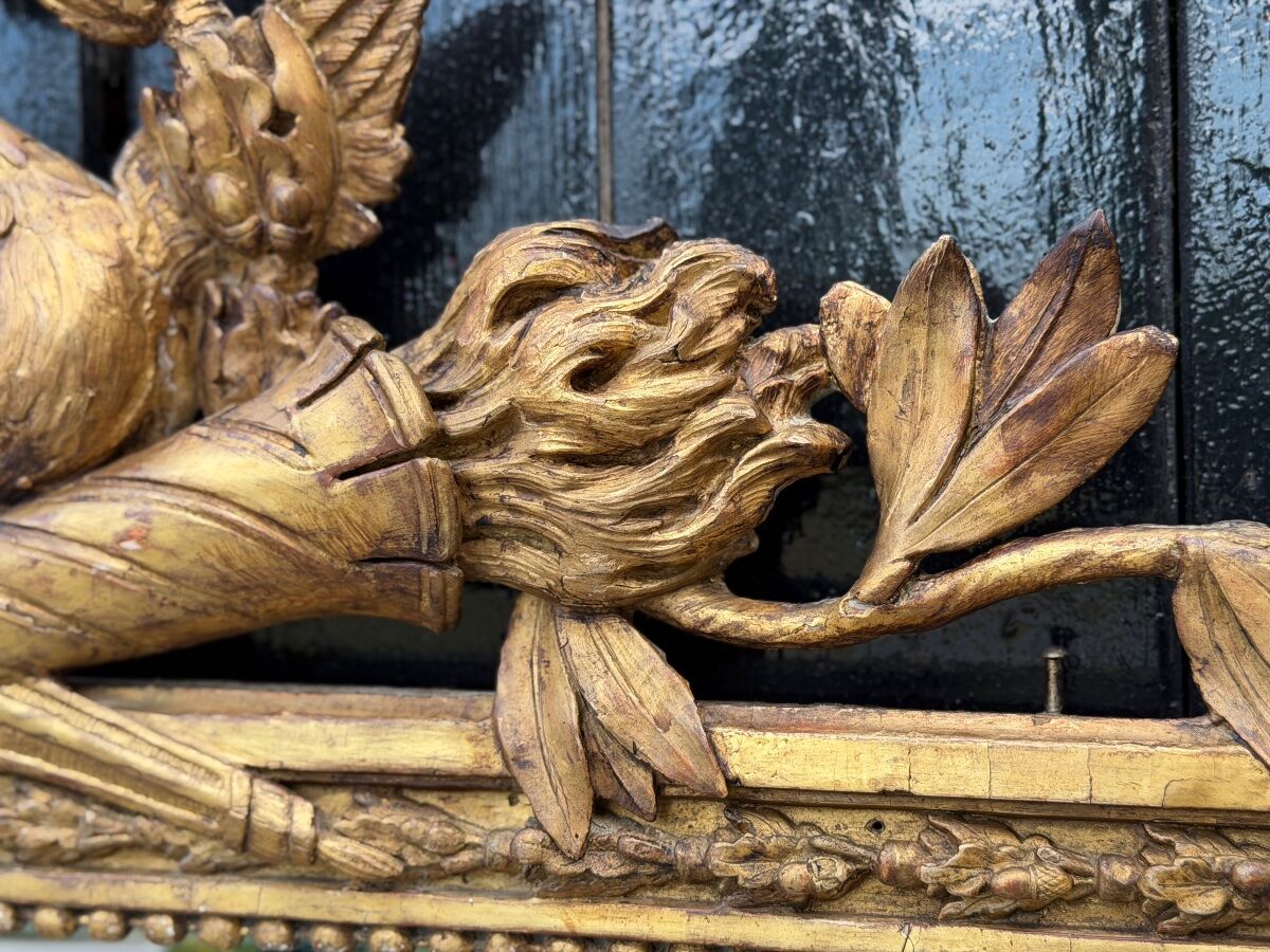 Louis XVI mirror in carved and gilded wood, 18th century