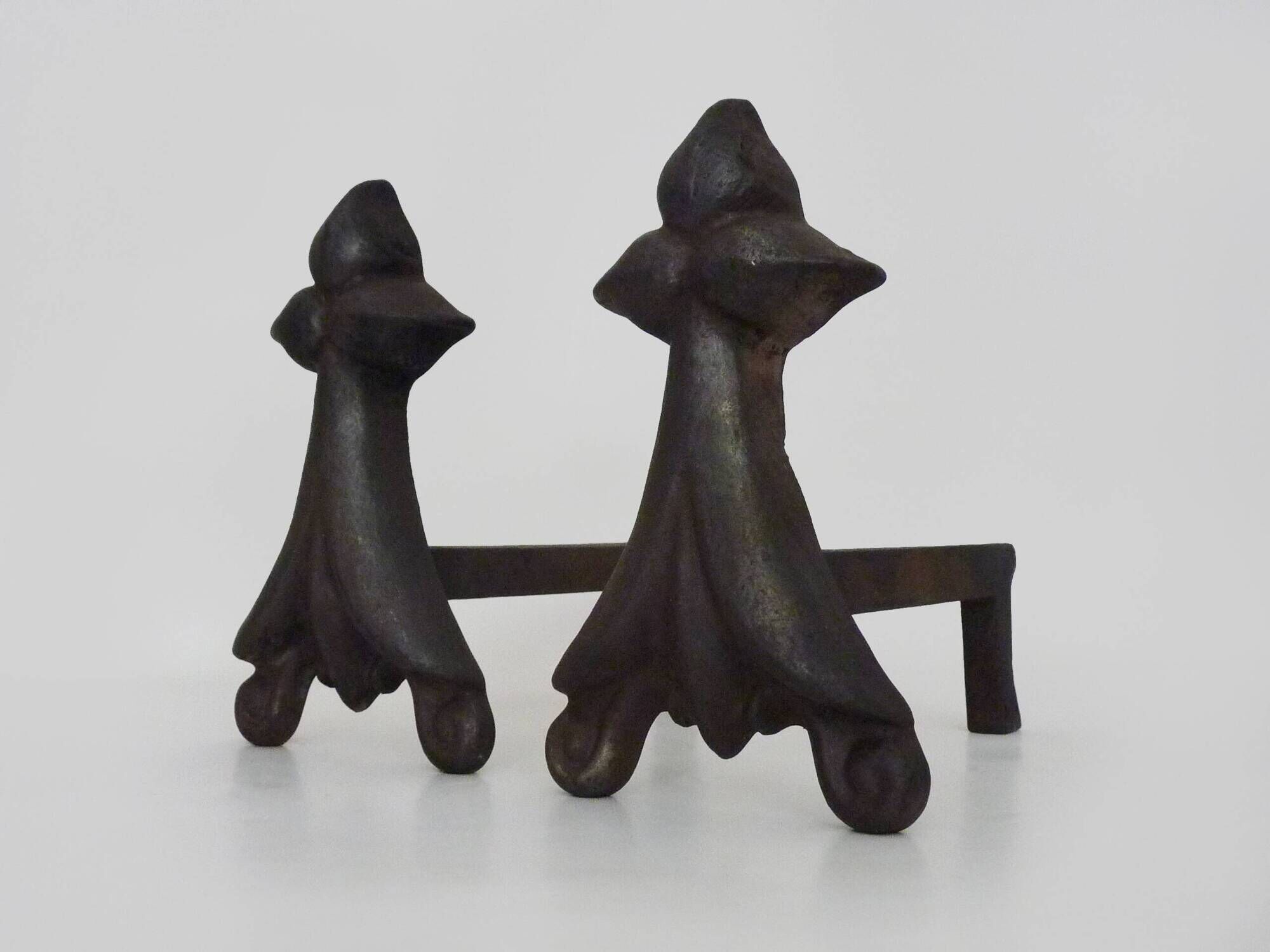 Pair of cast iron fireplace andirons. France, 19th century.