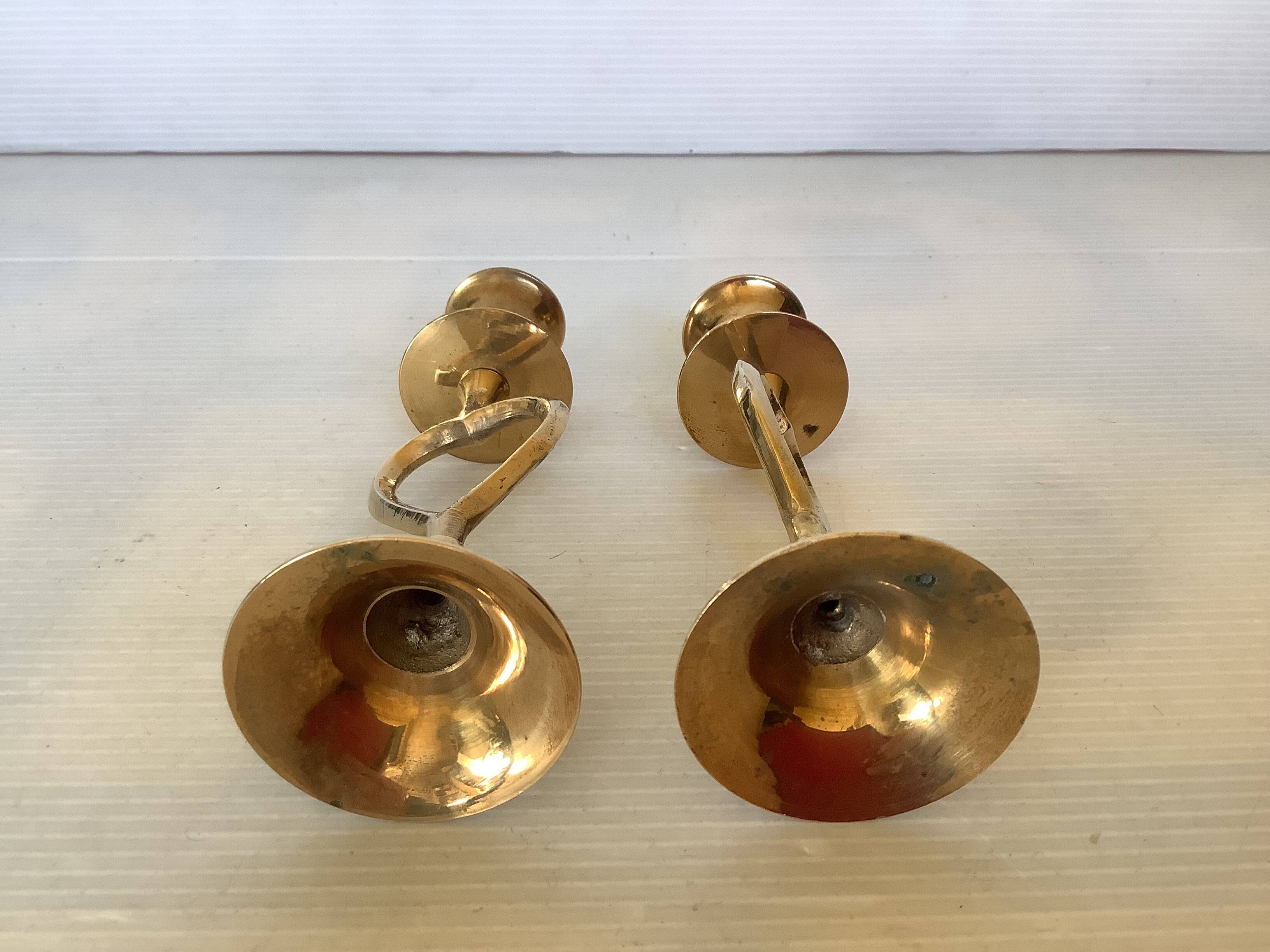 Pair of small brass heart candlesticks