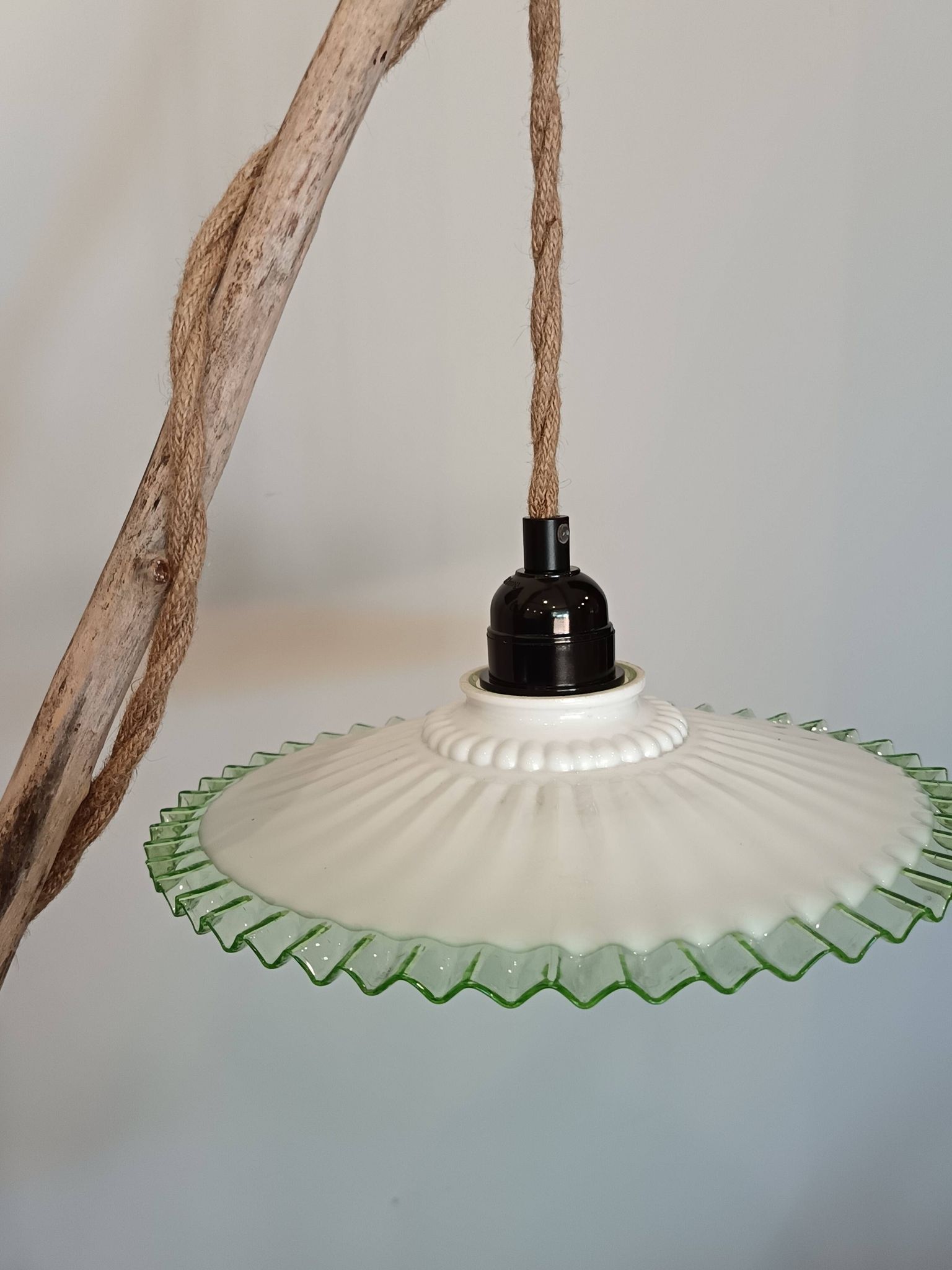 Portable lamp in pale green and white glass