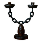 Sculpted wooden and wrought iron brutalist double chandelier from the 1960s.