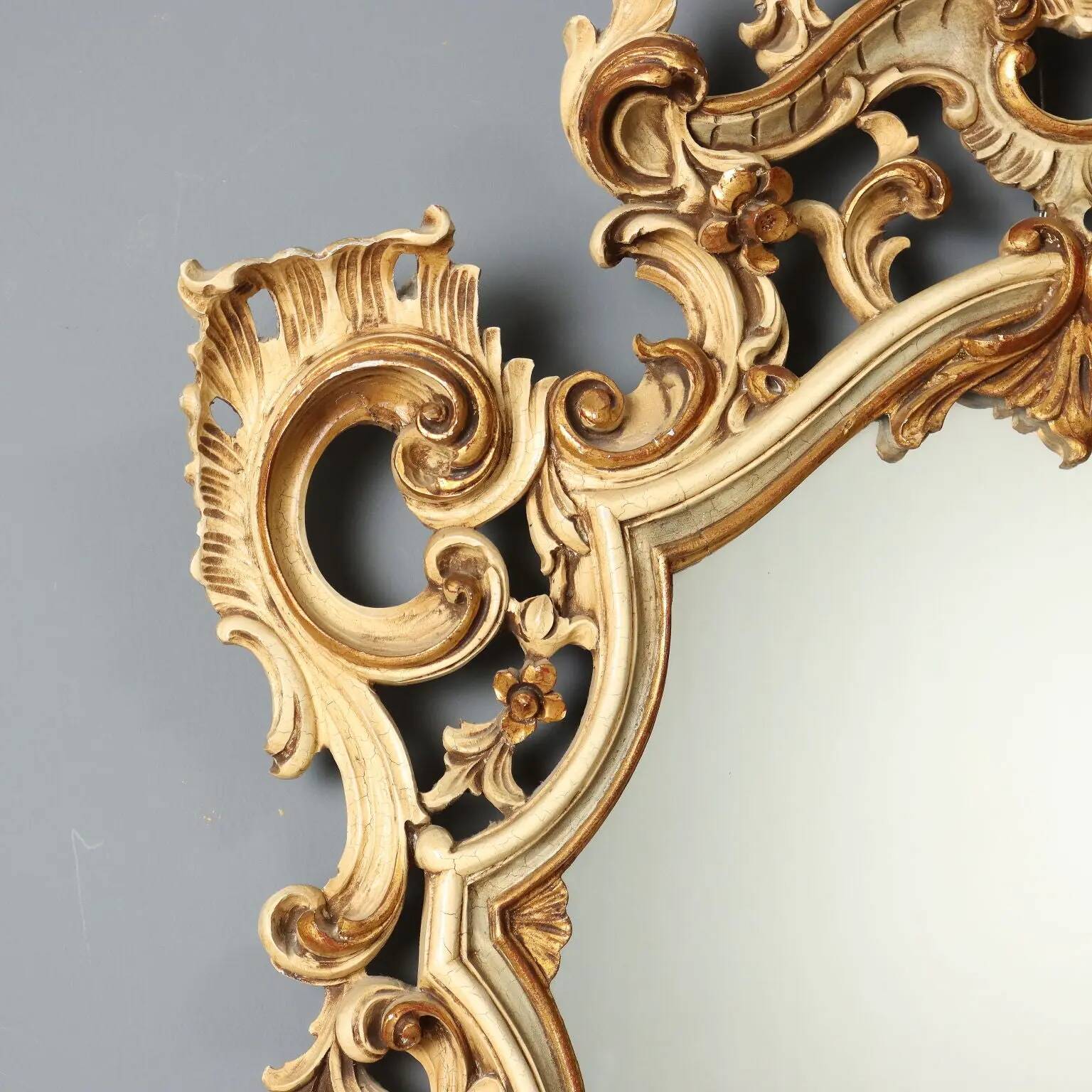 Antique lacquered and gilded wooden mirror, Italy, early 20th century.