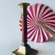 Old candle holder in brass and wood