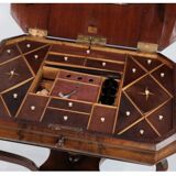 Antique mahogany sewing table on a pillar from around the year 1840s