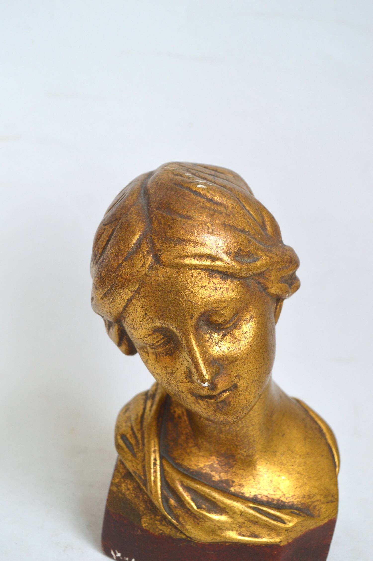 Gilded plaster bust