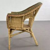 Rattan and wicker cabriolet-style armchair with green and red edging