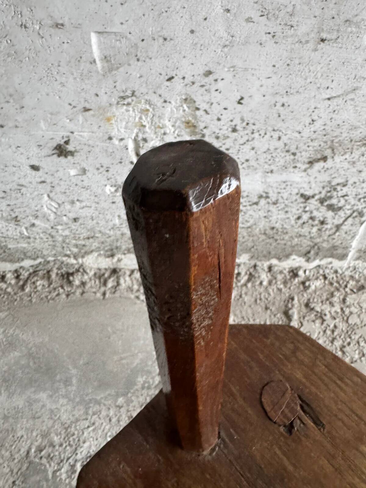 Dark brown solid oak brutalist stool with sculptural backrest, handcrafted mid-century rustic primitive