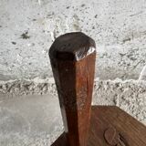 Dark brown solid oak brutalist stool with sculptural backrest, handcrafted mid-century rustic primitive