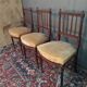 Three Louis XVI-style mahogany chairs