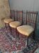 Three Louis XVI-style mahogany chairs