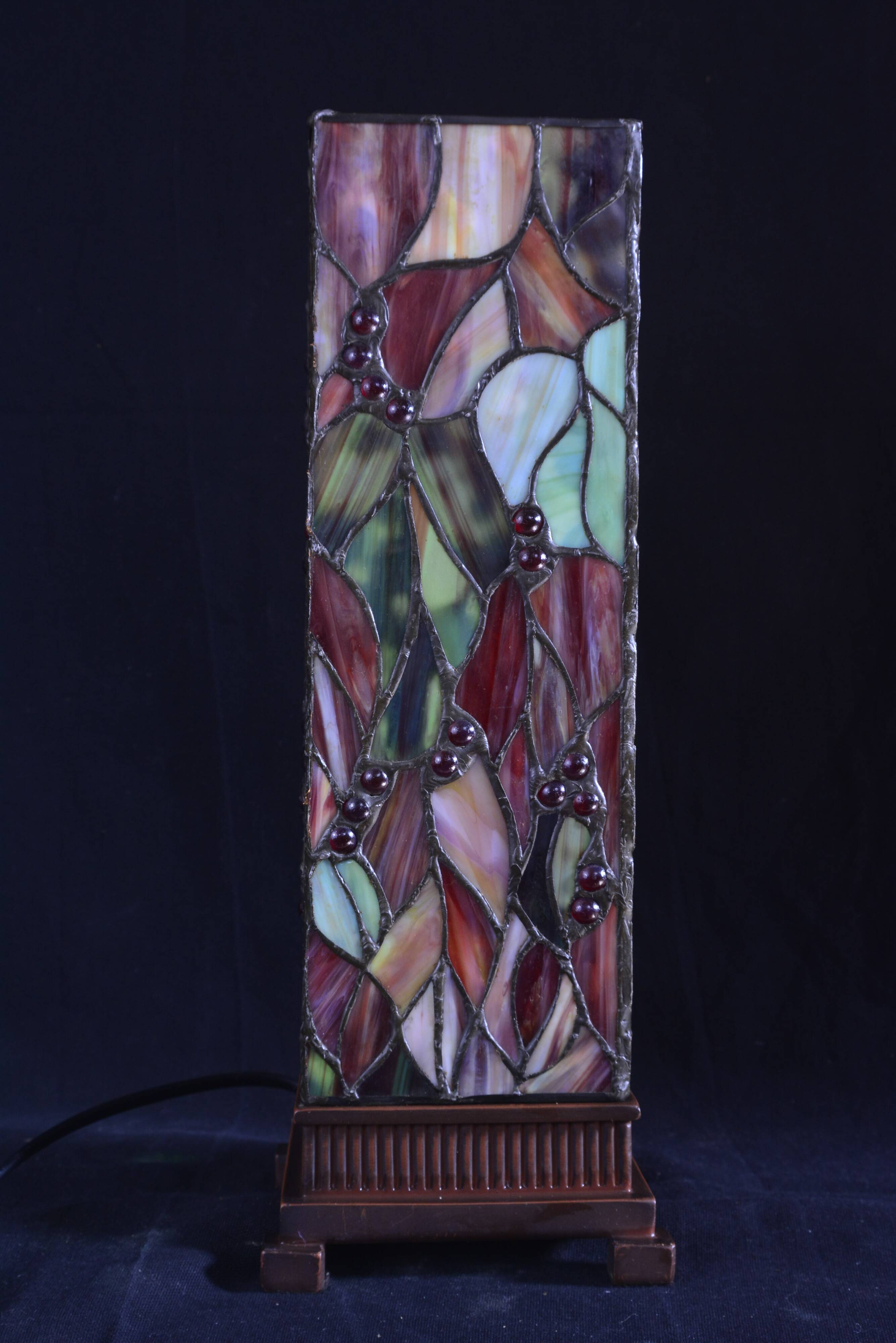 Stained glass lamp in the style of Tiffany