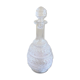 Blown glass decanter and relief decoration