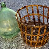 Demijohn in his iron cager