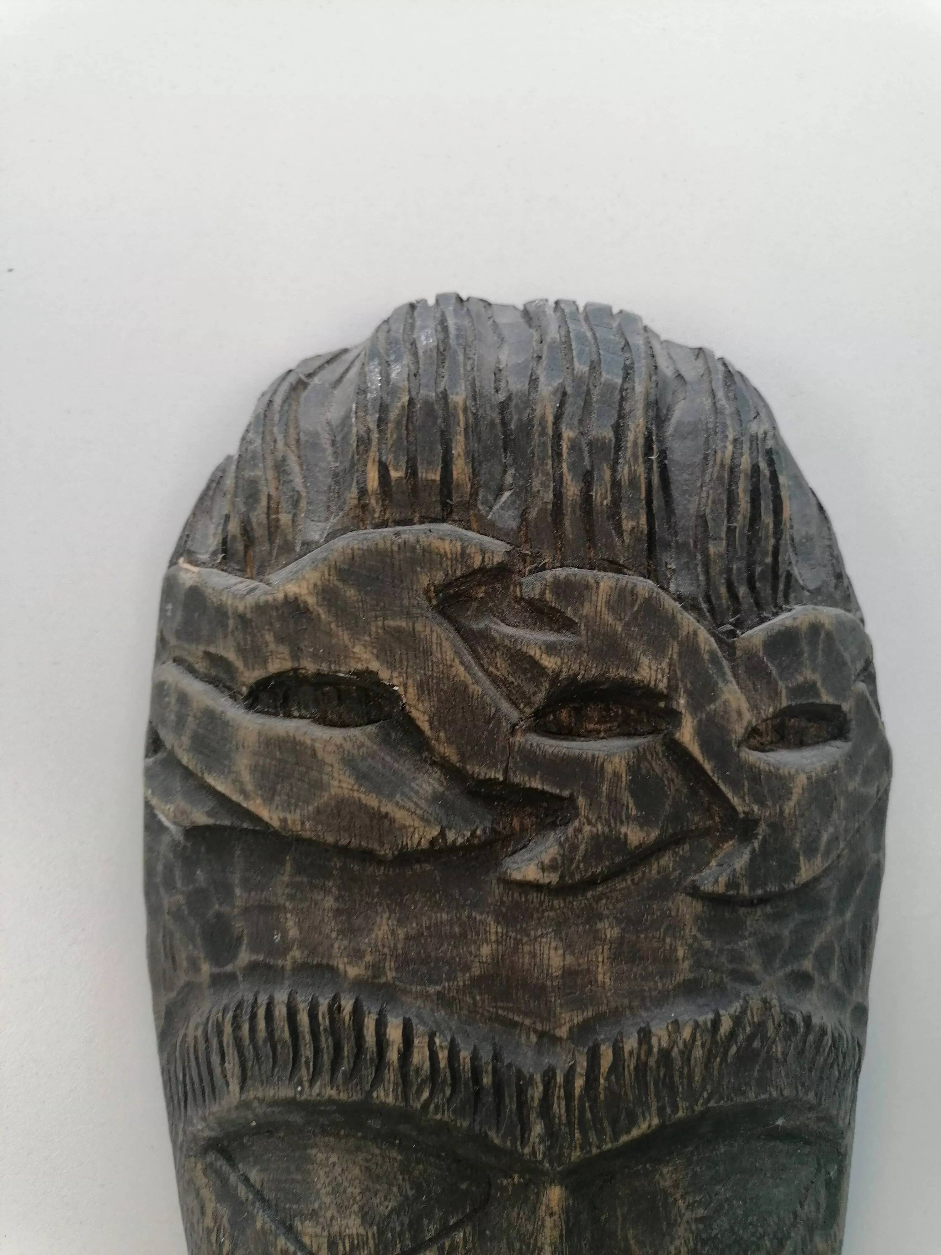 African tribal mask in carved wood - decorative ethnic art