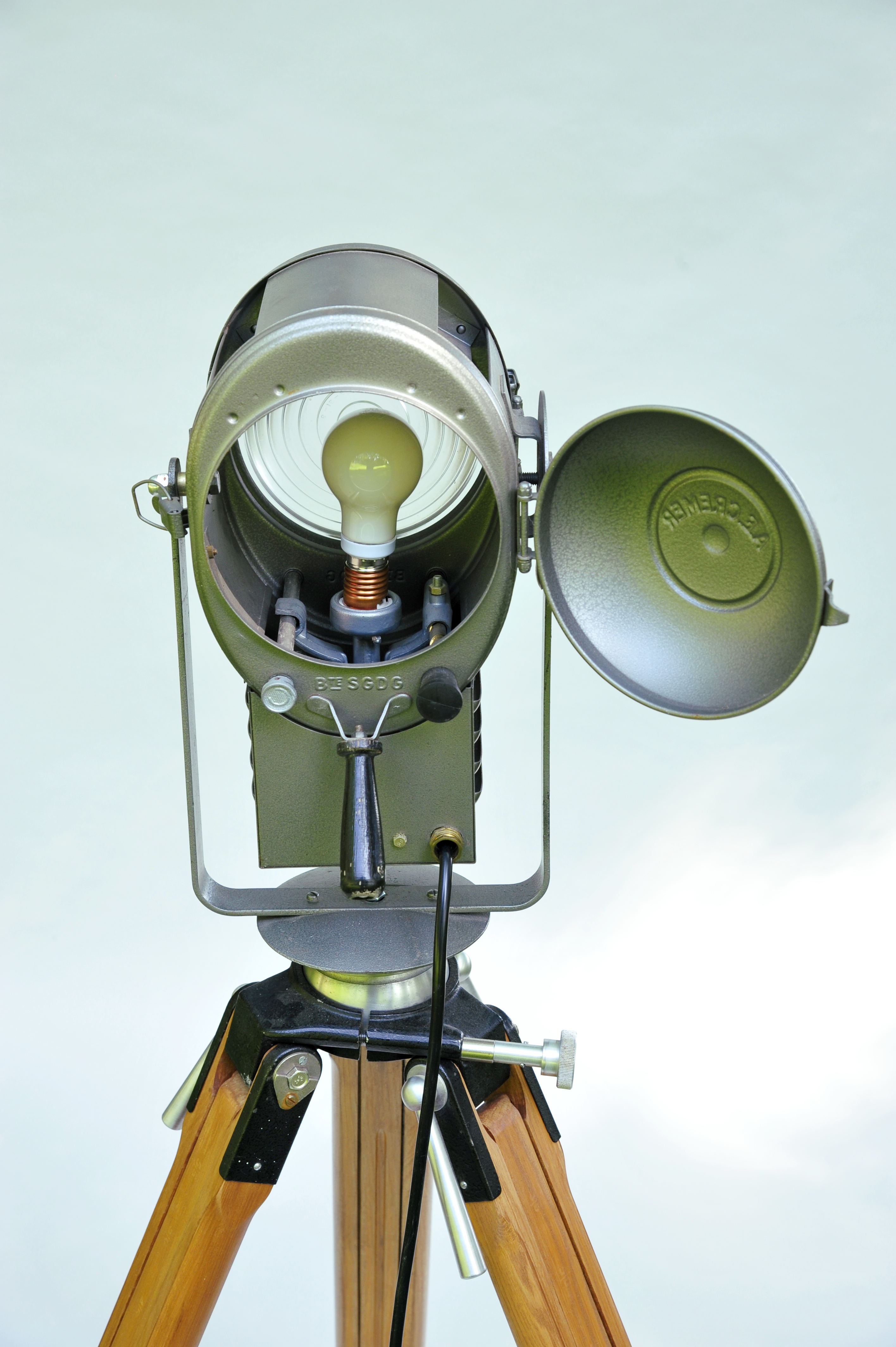 Cremer cinema projector on wooden tripod